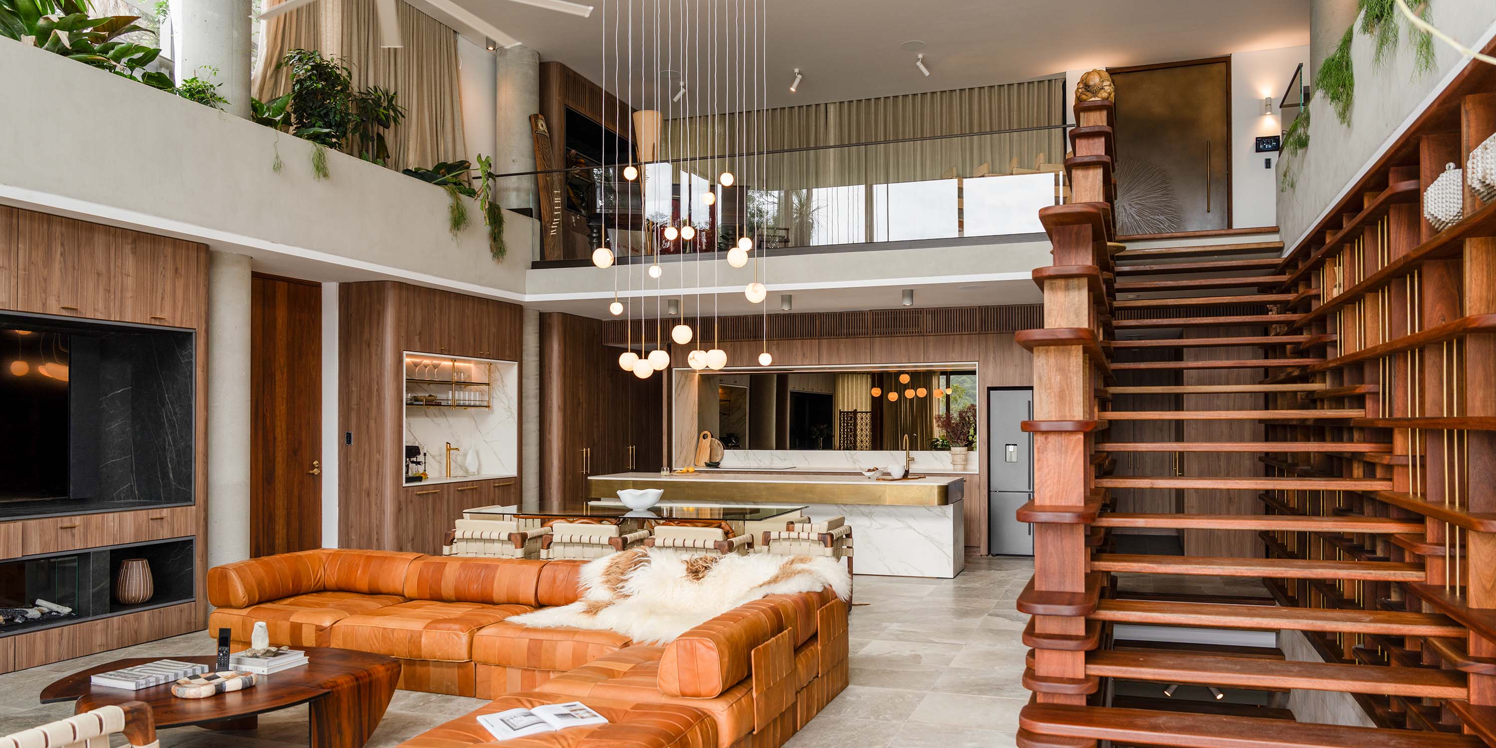 mid century modern living room with wooden details and accents and hanging light fixtures