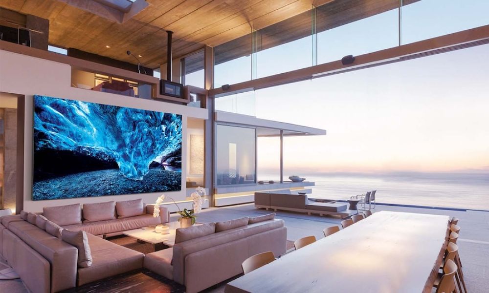 A large Samsung video wall in an indoor-outdoor patio space in coastal Florida